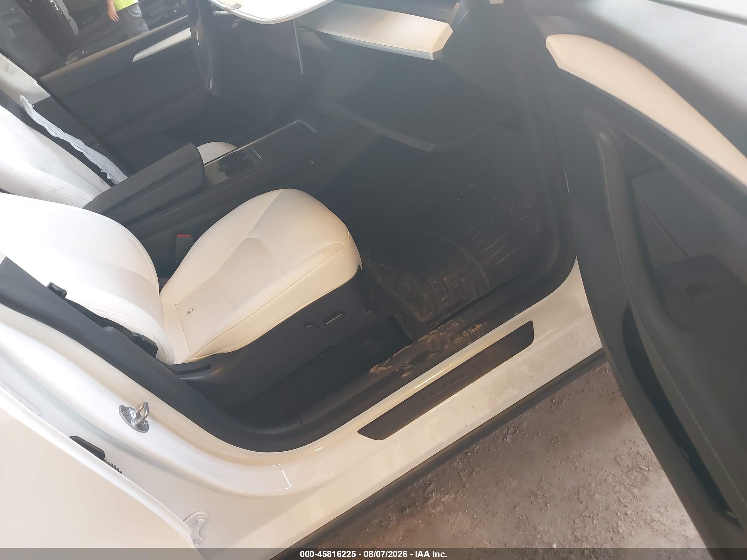 2023 Tesla Model Y Awd/long Range Dual Motor All-wheel Drive White vin: 7SAYGDEE7PF619509