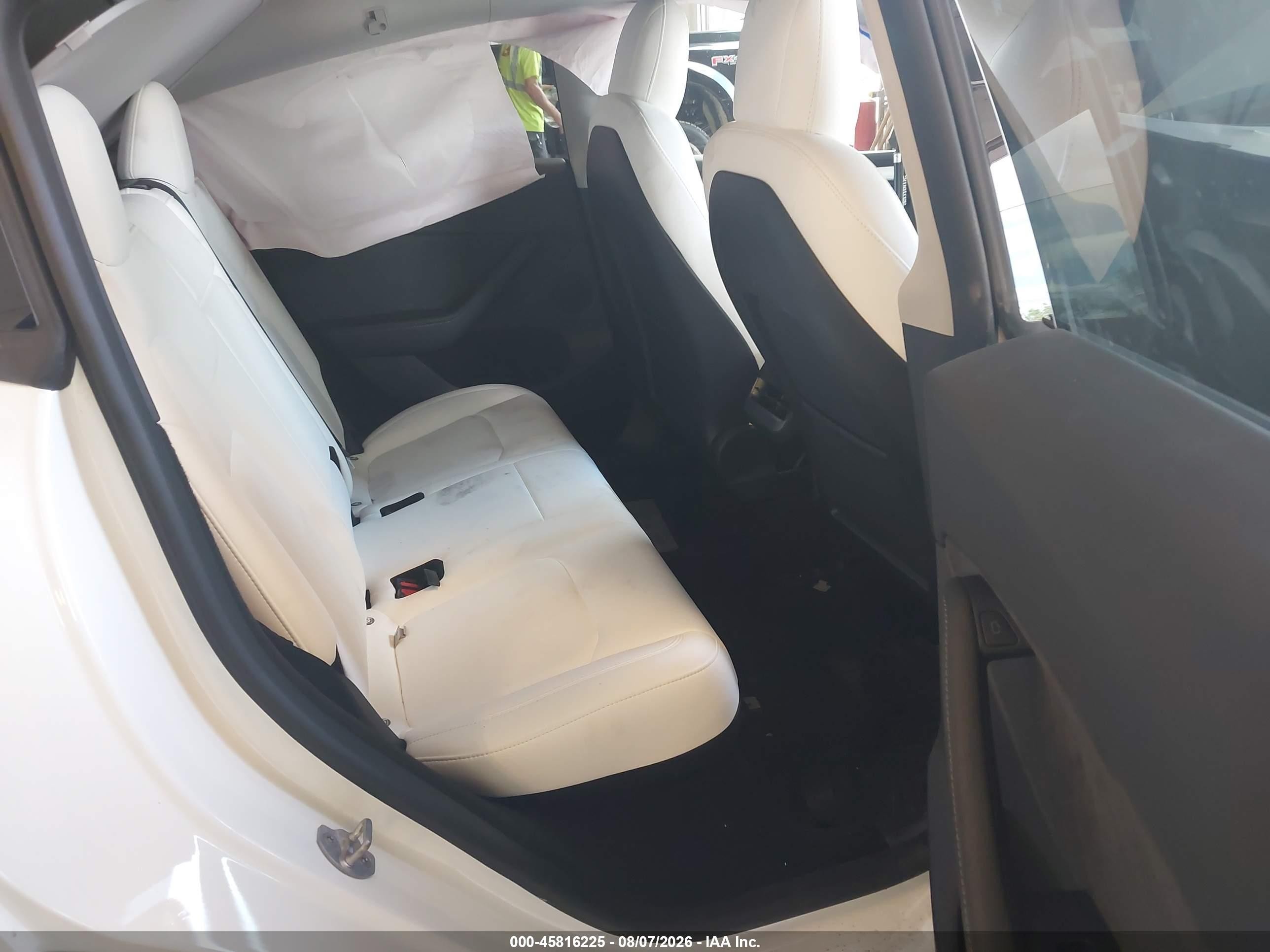 2023 Tesla Model Y Awd/long Range Dual Motor All-wheel Drive White vin: 7SAYGDEE7PF619509
