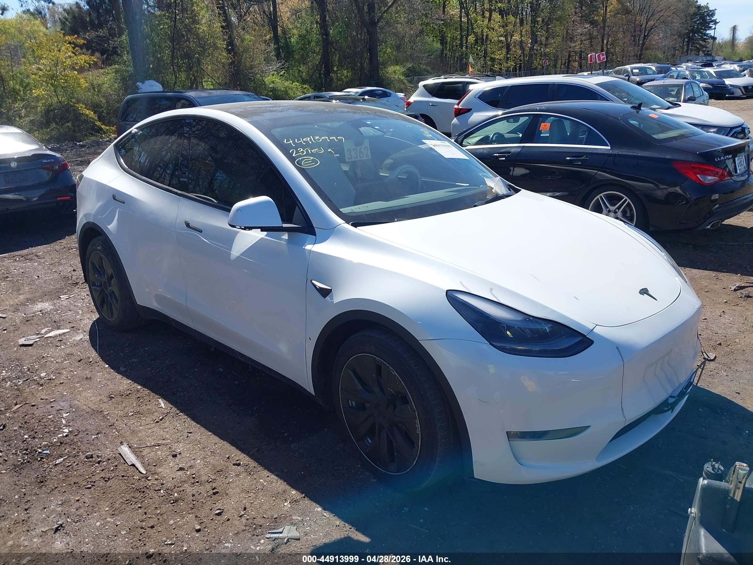 2023 Tesla Model Y Awd/long Range Dual Motor All-wheel Drive White vin: 7SAYGDEE8PF802868