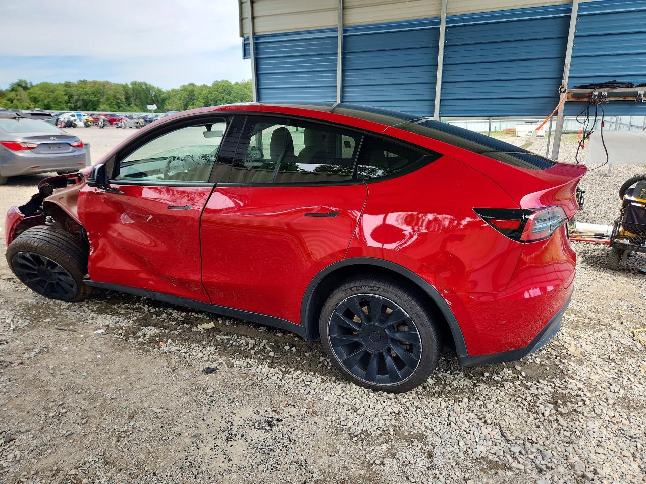 2023 Tesla Model Y Red vin: 7SAYGDEE9PF750019
