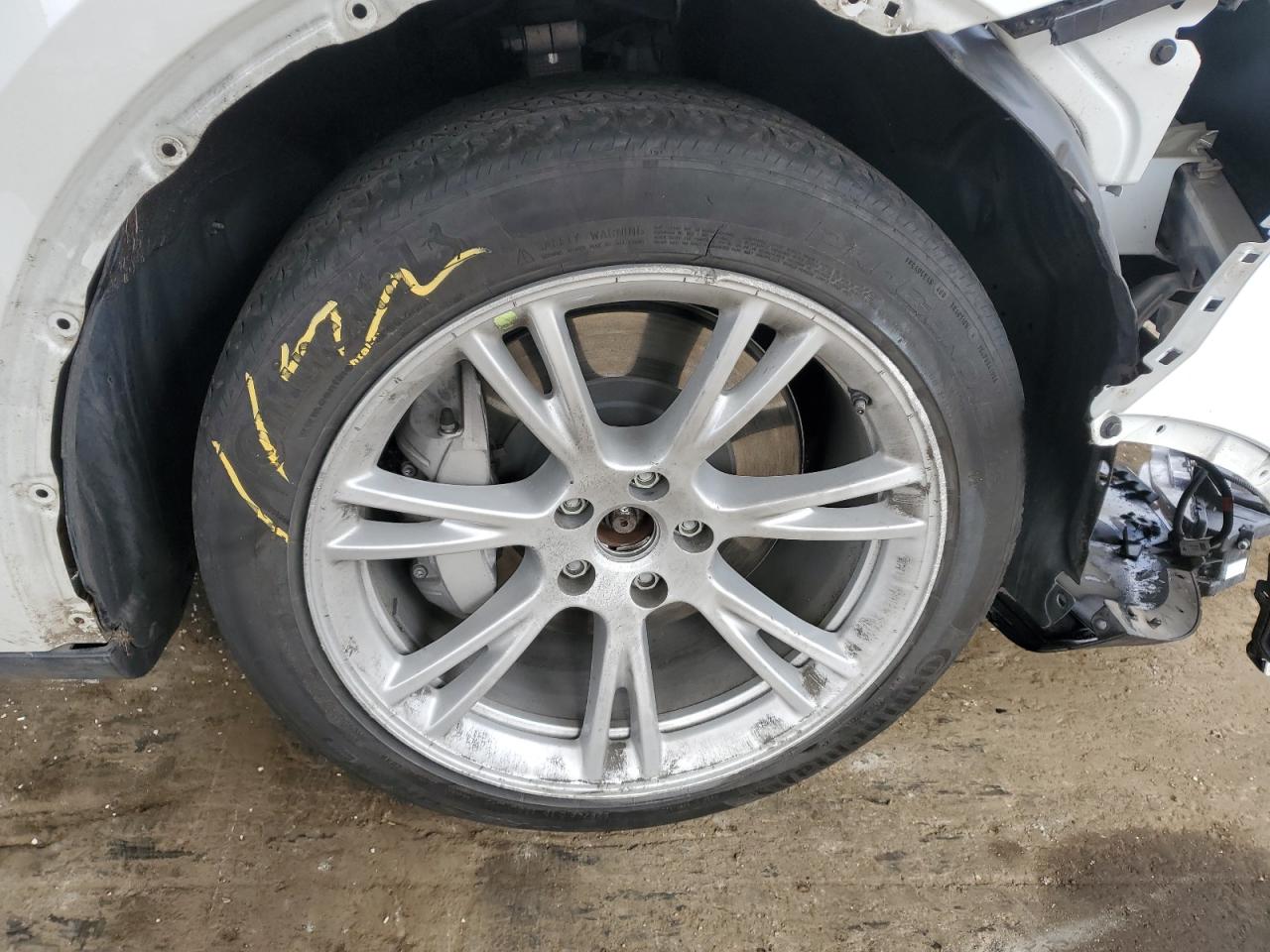2023 Tesla Model Y White vin: 7SAYGDEEXPF638958 Damage: Right Front Wheel Cover, Missing, Replacement Required