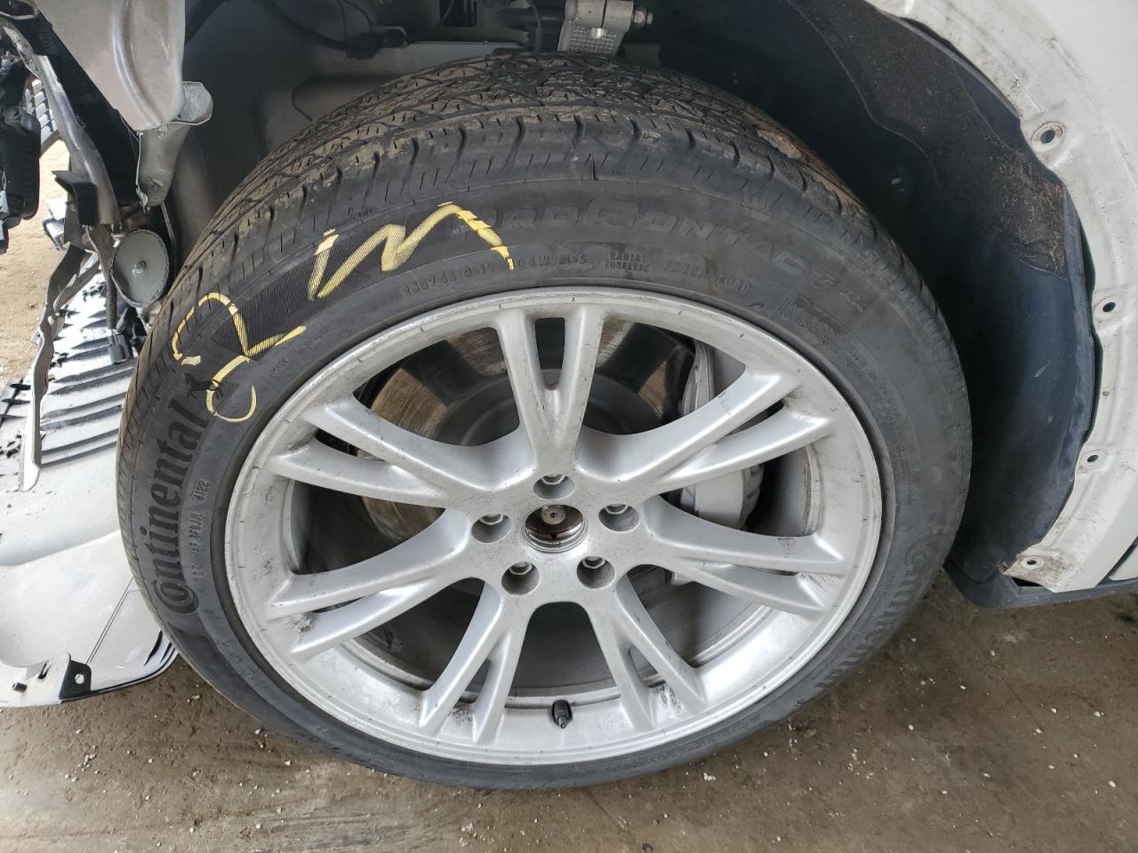 2023 Tesla Model Y White vin: 7SAYGDEEXPF638958 Damage: Left Front Wheel Cover, Missing, Replacement Required