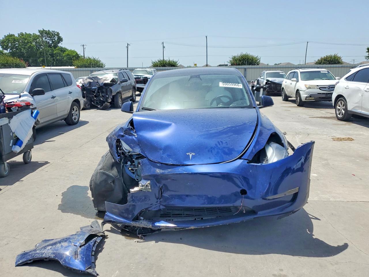 2023 Tesla Model Y Blue vin: 7SAYGDEF2PF749870