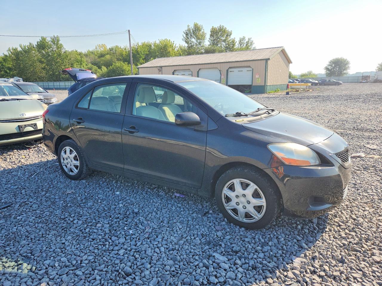 2010 Toyota Yaris Base Black vin: JTDBT4K37A1376091