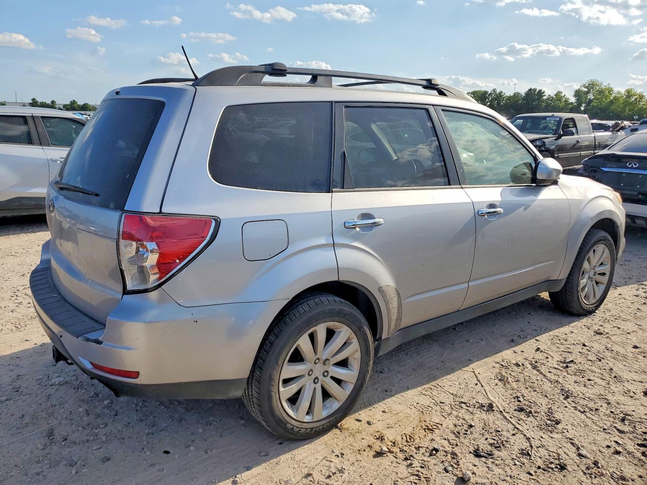 2012 Subaru Forester Limited Silver vin: JF2SHBEC7CH412911