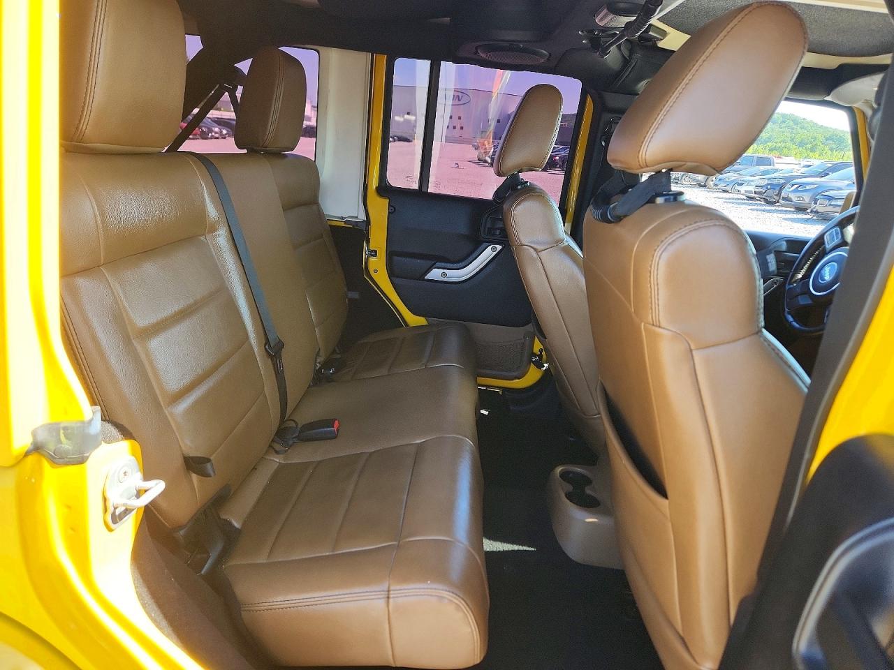 2011 Jeep Wrangler Unlimited Sahara Yellow vin: 1J4HA5H12BL530282
