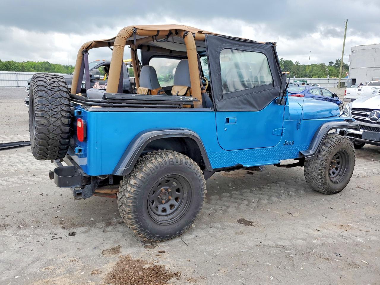 1994 Jeep Wrangler / Yj Sahara Blue vin: 1J4FY49S2RP421926