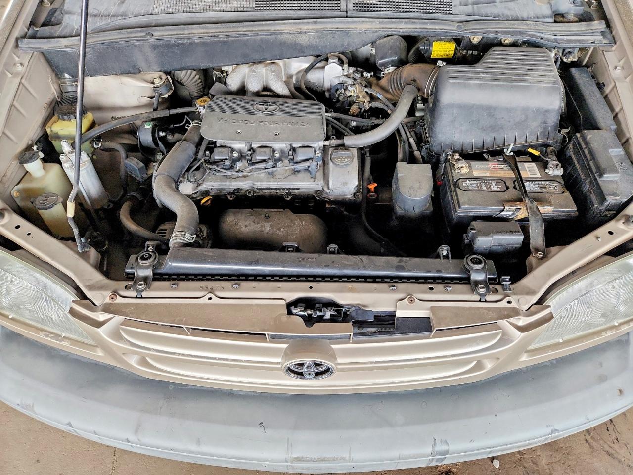 2000 Toyota Sienna Le Tan vin: 4T3ZF13C5YU268342