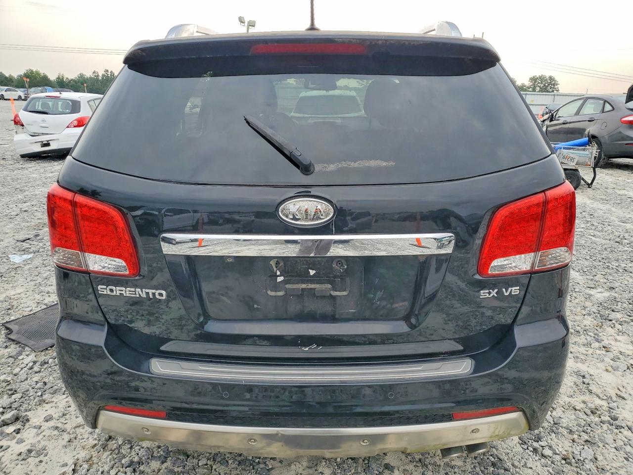 2012 Kia Sorento Sx Черный vin: 5XYKW4A22CG254225