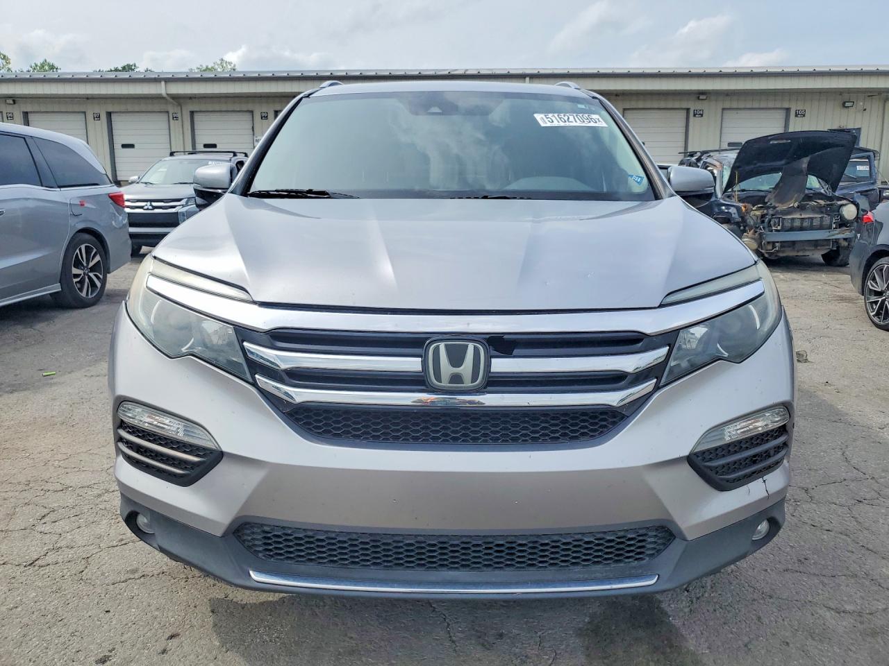 2016 Honda Pilot Touring Серебряный vin: 5FNYF6H98GB014733