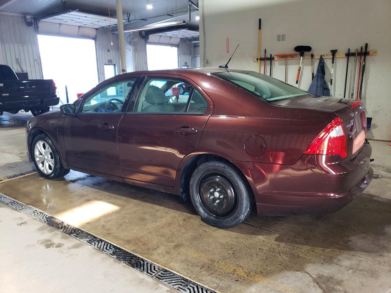 2012 Ford Fusion S Burgundy vin: 3FAHP0GA7CR202860