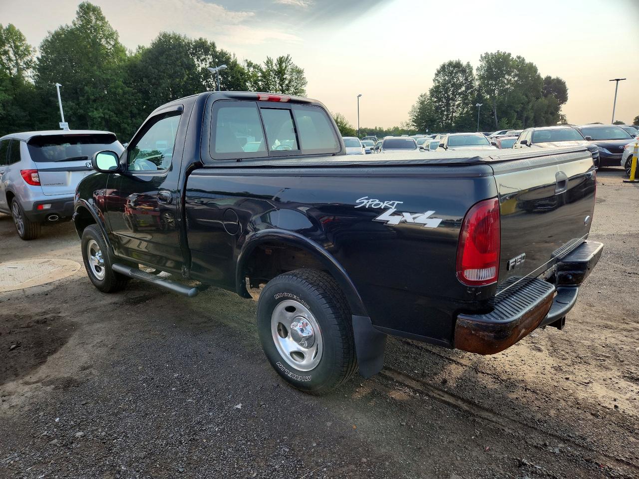 2002 Ford F150 Black vin: 1FTRF182X2NA47575