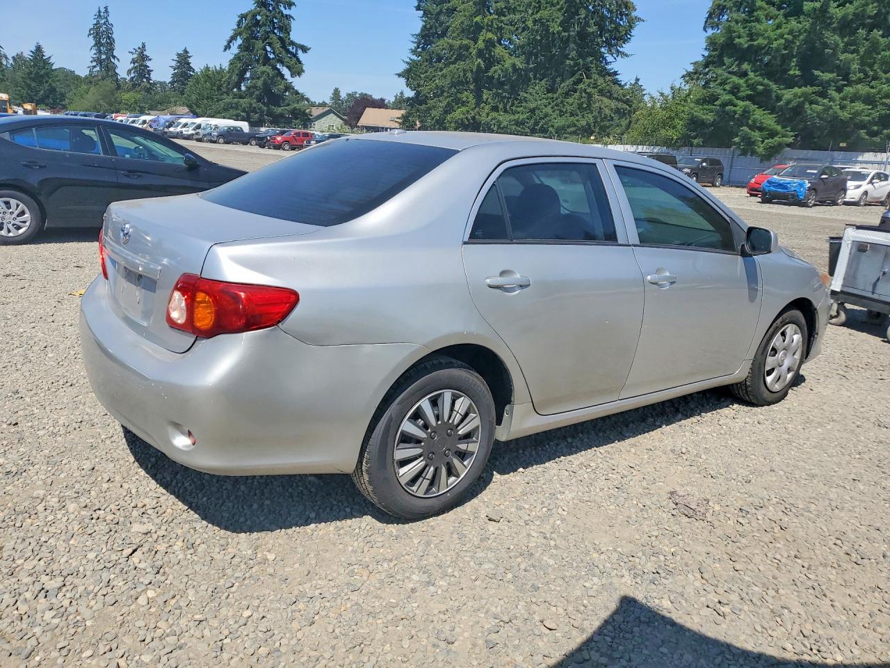 2009 Toyota Corolla Le Silver vin: 1NXBU40E89Z062666