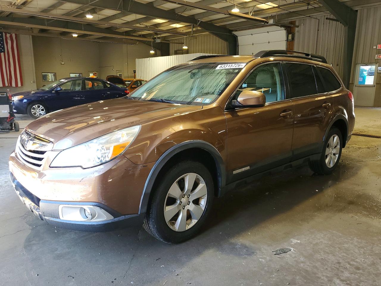 2012 Subaru Outback 2.5i Premium Tan vin: 4S4BRBCCXC3245399
