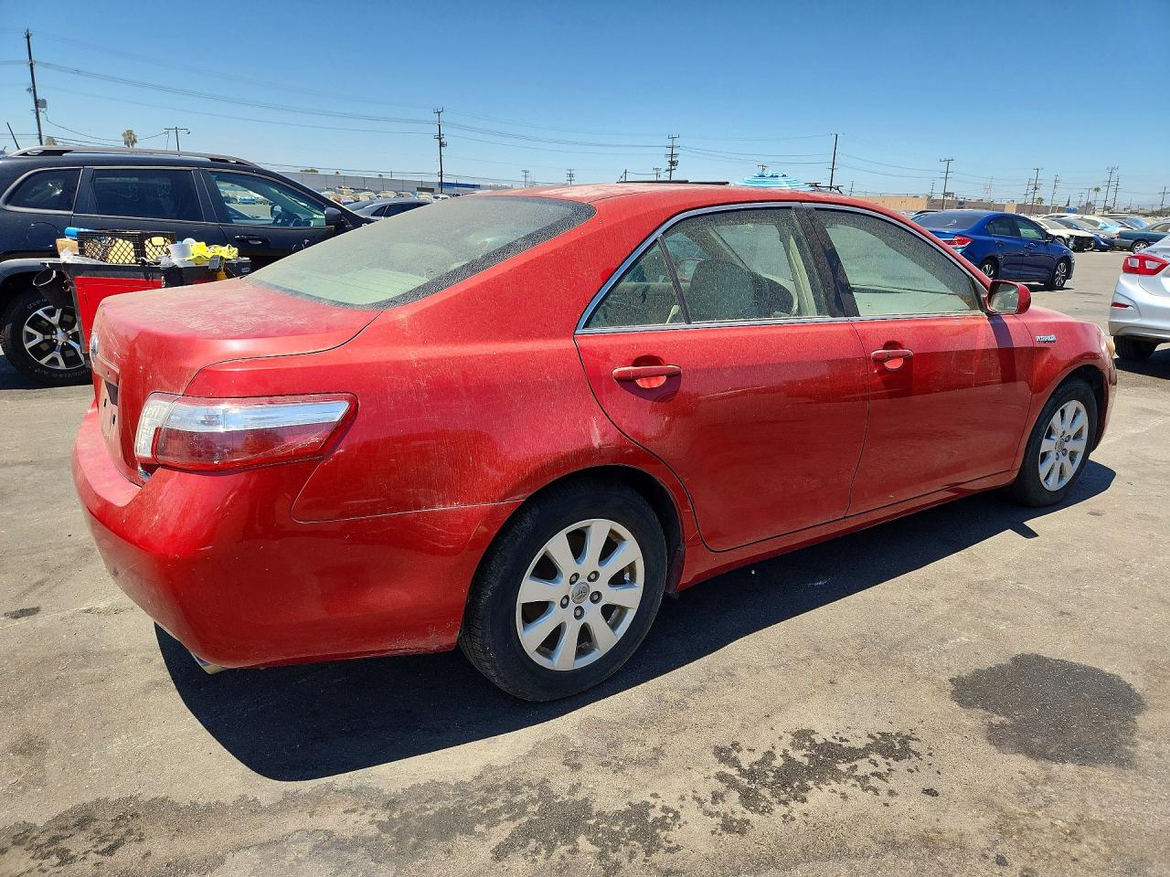 2007 Toyota Camry Hybrid Red vin: JTNBB46K973018486