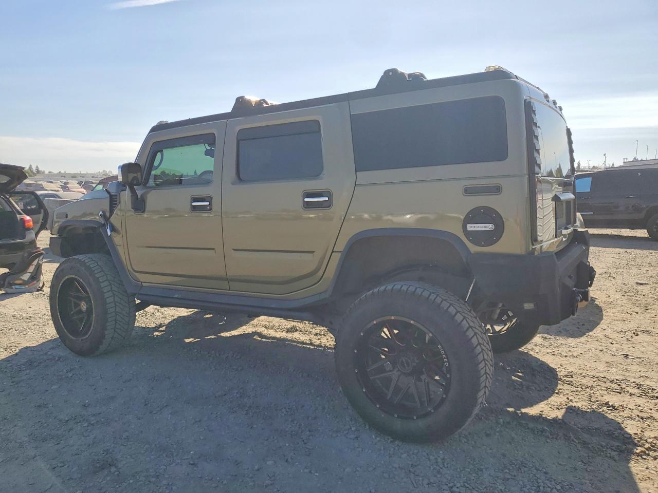 2005 Hummer H2 Tan vin: 5GRGN23U25H104734