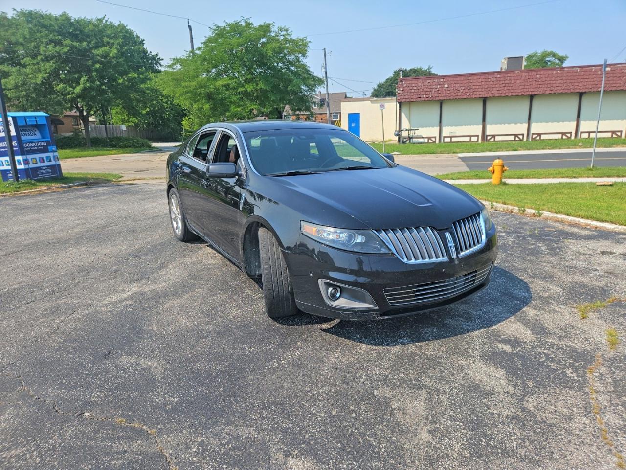 2012 Lincoln Mks Black vin: 1LNHL9FT8CG806403