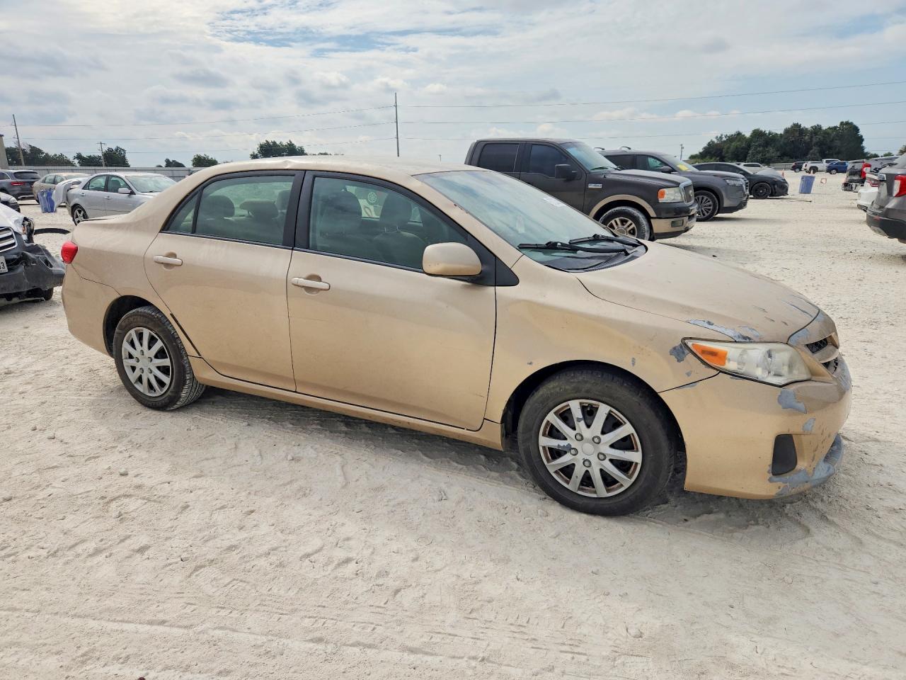 2011 Toyota Corolla Le Золотой vin: JTDBU4EE9B9148610