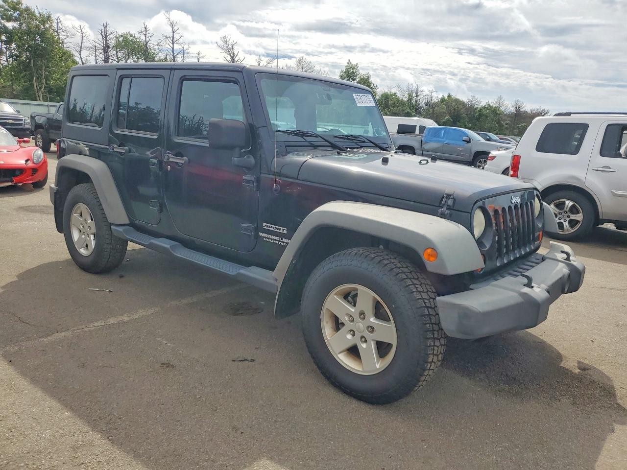 2012 Jeep Wrangler Unlimited Sport Black vin: 1C4BJWDG9CL142513