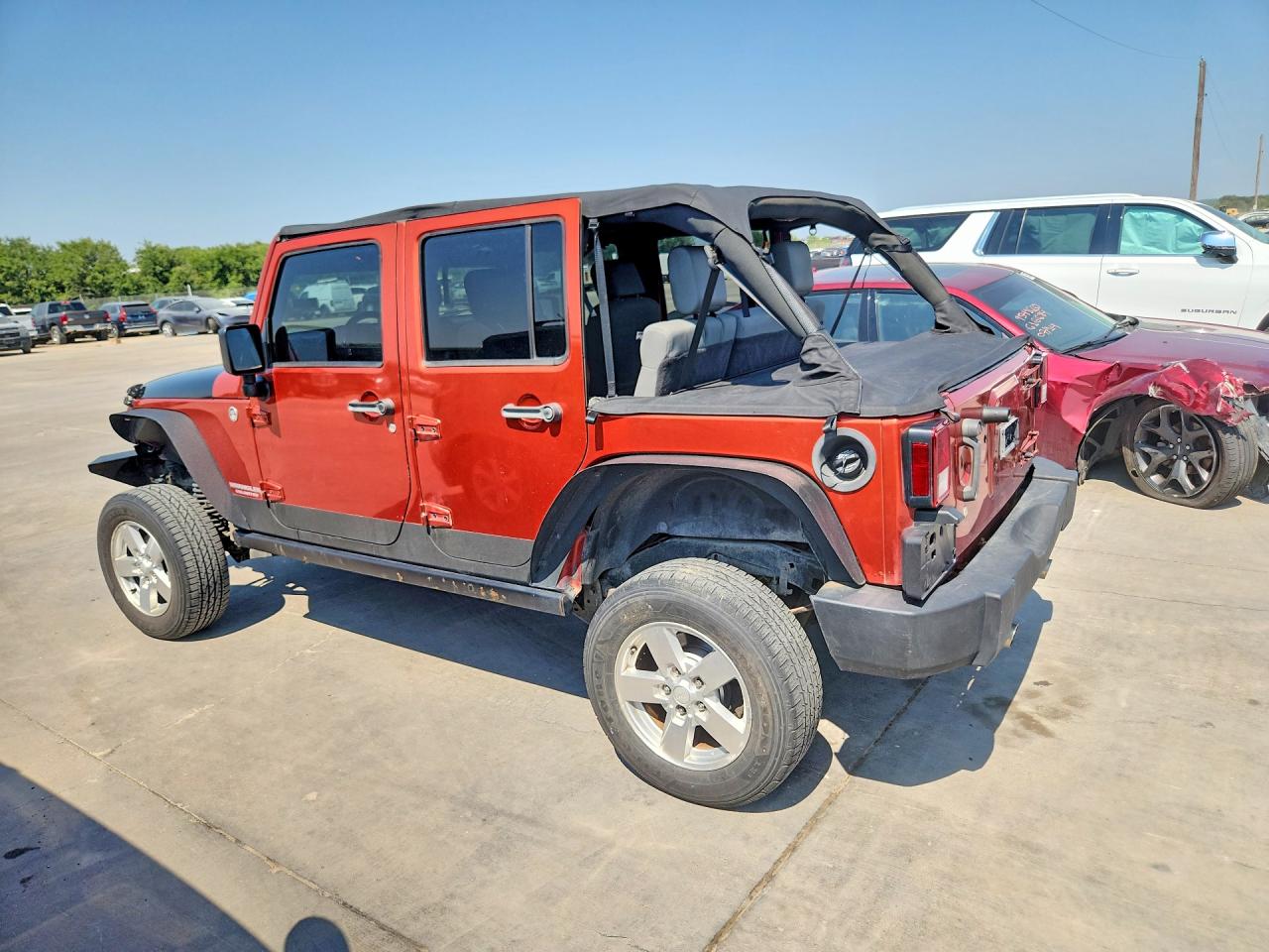 2009 Jeep Wrangler Unlimited Rubicon Red vin: 1J4GA69199L769399