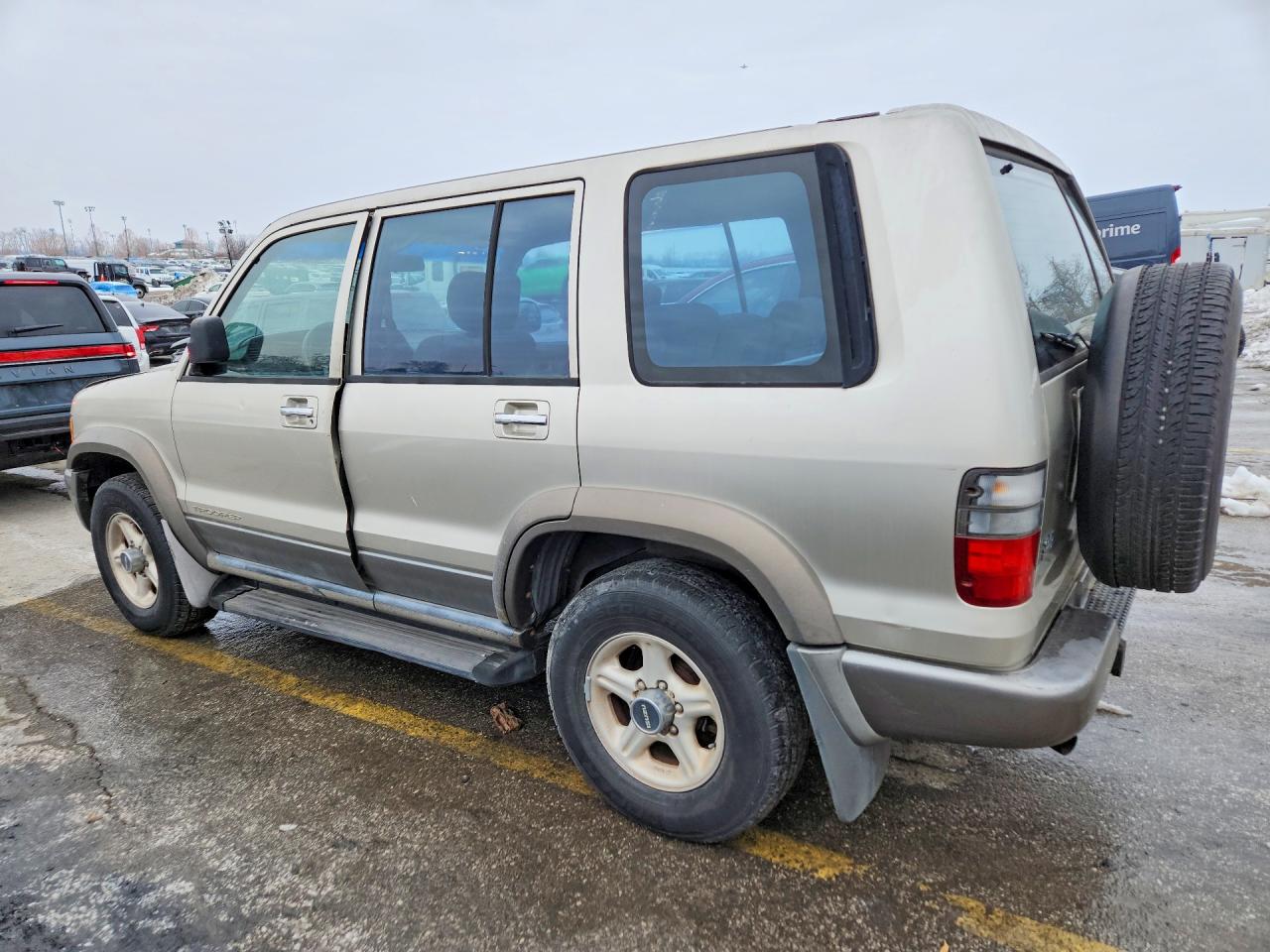 2000 Isuzu Trooper S Tan vin: JACDS58X1Y7J08798