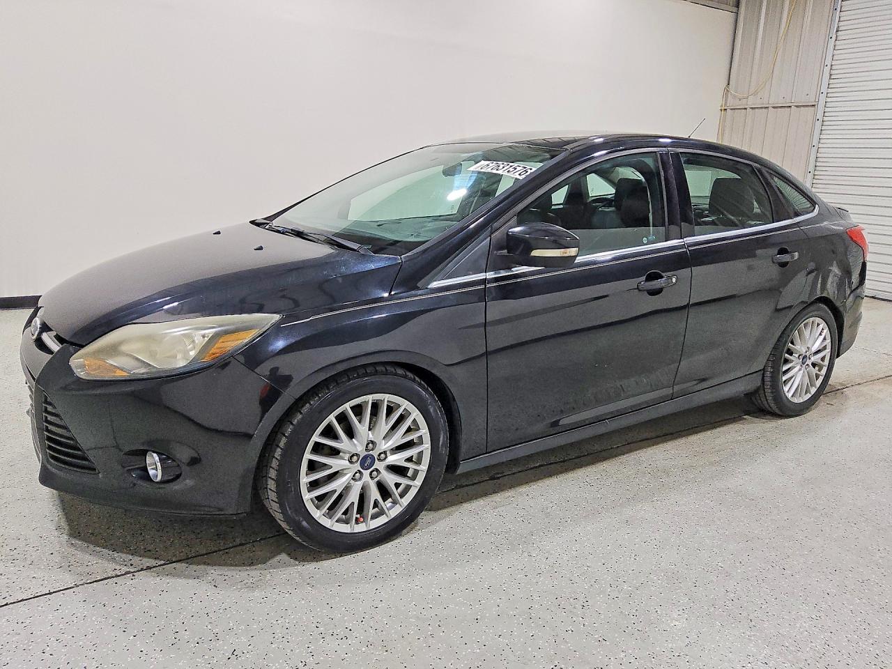 2014 Ford Focus Titanium Black vin: 1FADP3J29EL104156