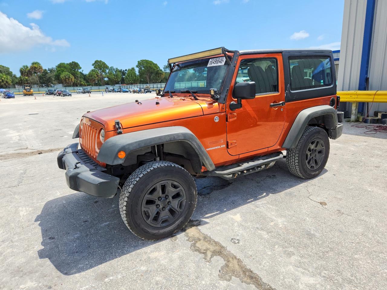 2011 Jeep Wrangler Sport Orange vin: 1J4AA2D16BL574551