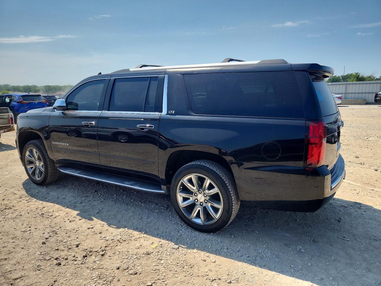 2015 Chevrolet Suburban C1500 Ltz Black vin: 1GNSCKKCXFR639842