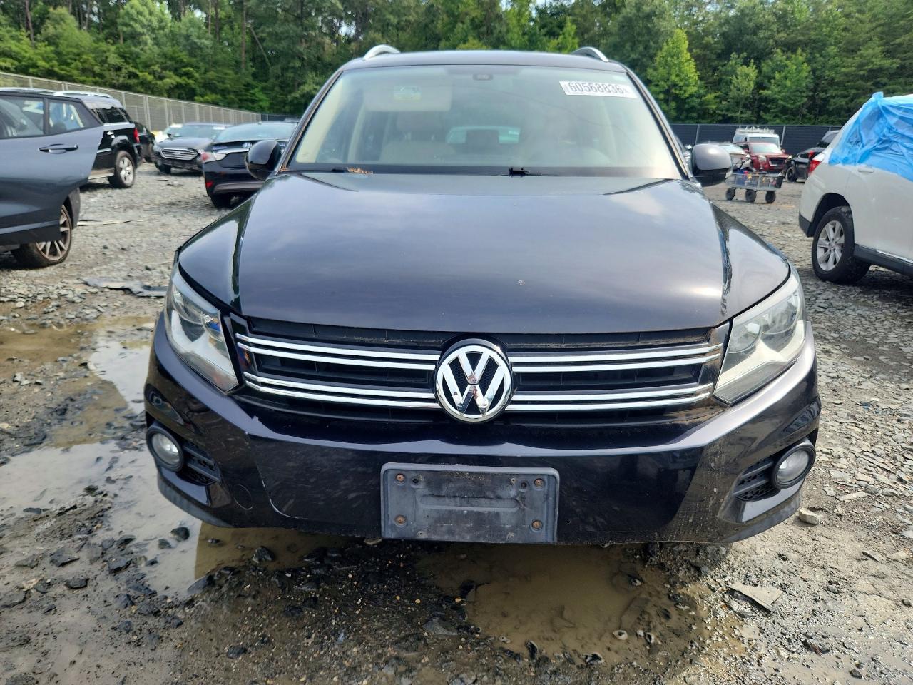 2014 Volkswagen Tiguan S Black vin: WVGAV3AXXEW608871