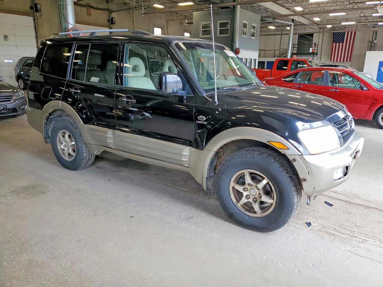 2002 Mitsubishi Montero Limited Black vin: JA4MW51RX2J003019