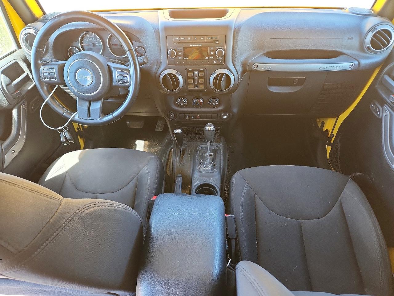 2015 Jeep Wrangler Unlimited Sport Yellow vin: 1C4BJWDGXFL679329