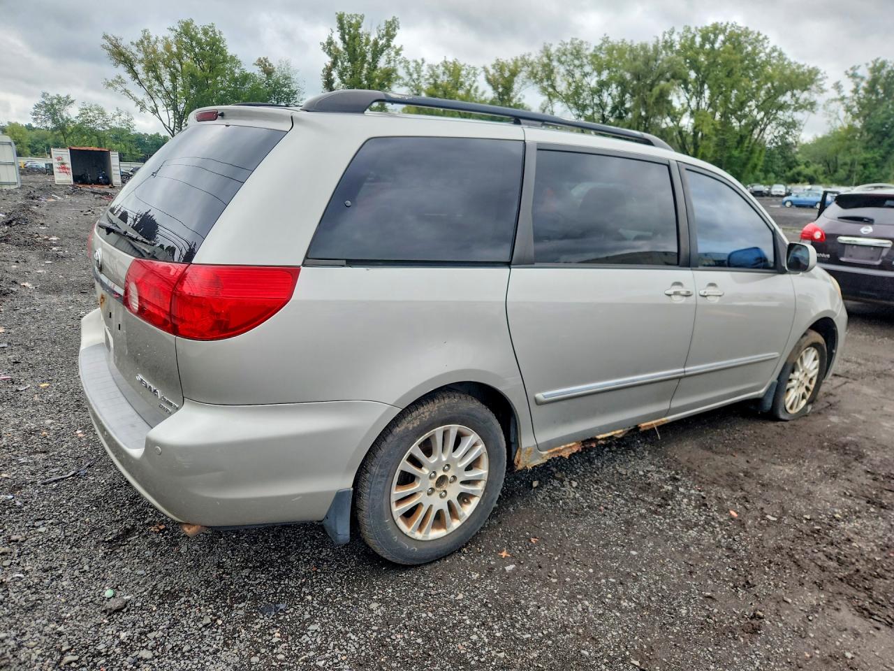 2009 Toyota Sienna Limited Beige vin: 5TDBK22C49S026293