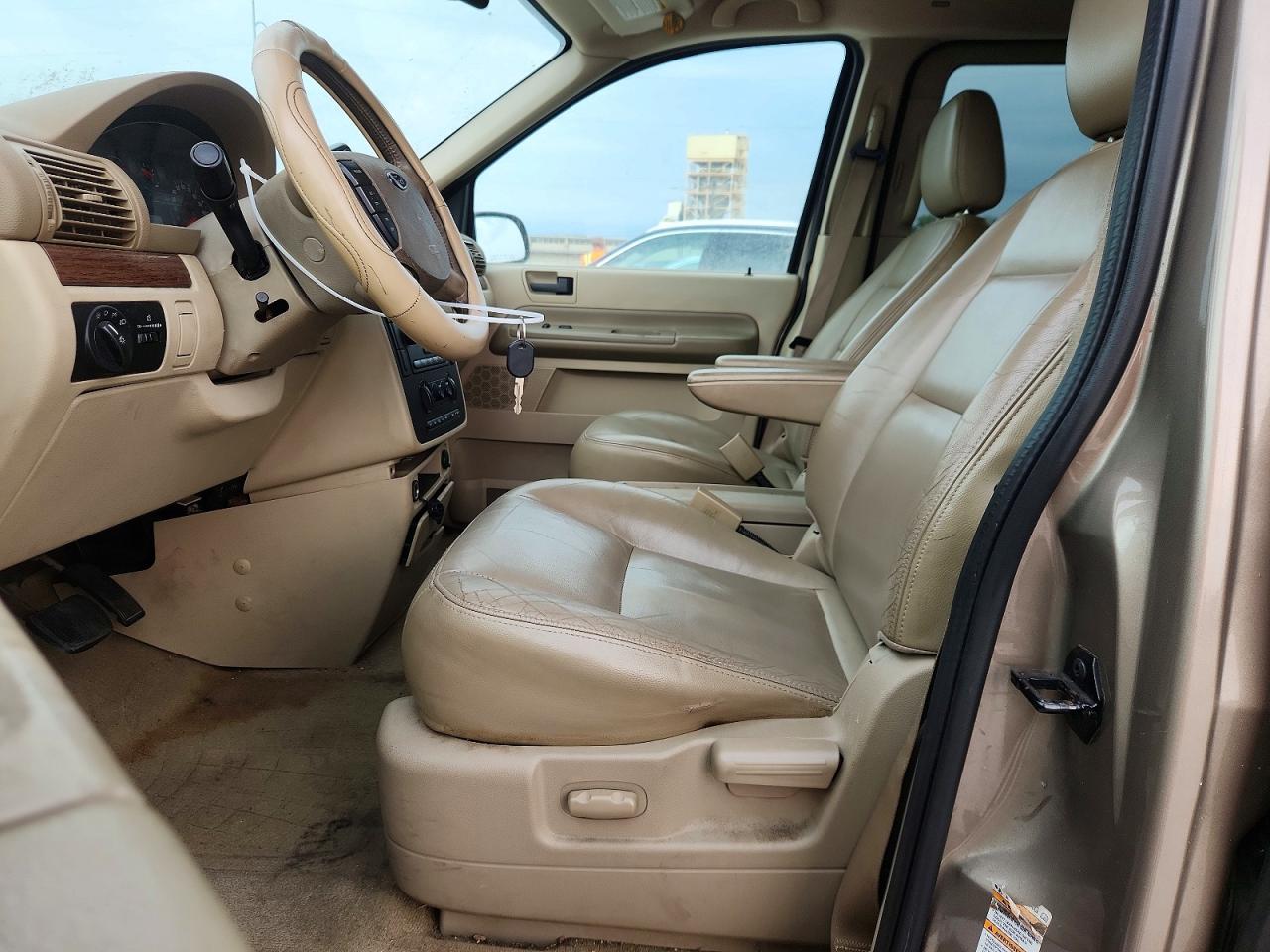2004 Ford Freestar Sel Золотой vin: 2FMDA52254BA25230