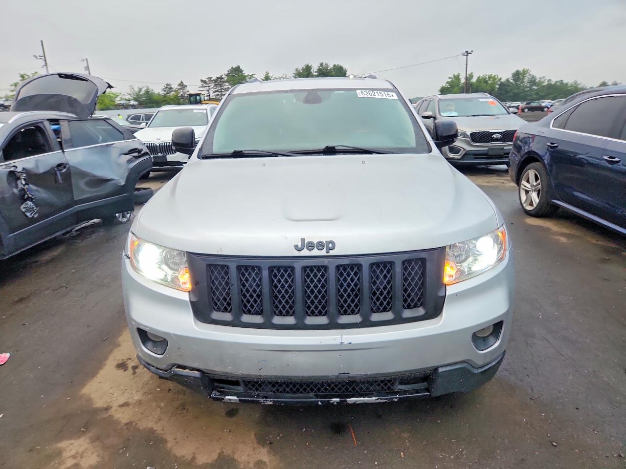 2012 Jeep Grand Cherokee Overland Silver vin: 1C4RJFCGXCC292257