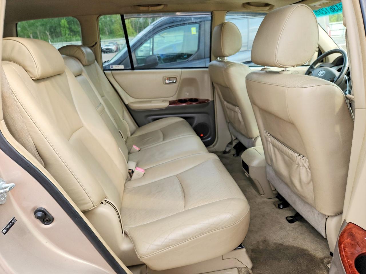 2006 Toyota Highlander Hybrid Gold vin: JTEEW21A460006749
