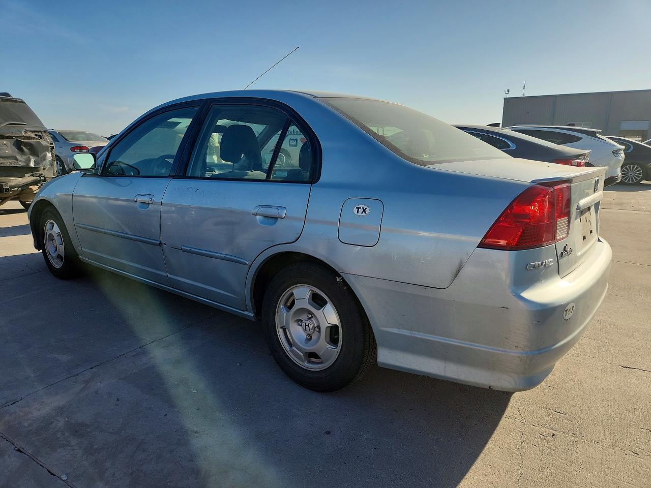 2004 Honda Civic Hybrid Blue vin: JHMES96684S017122