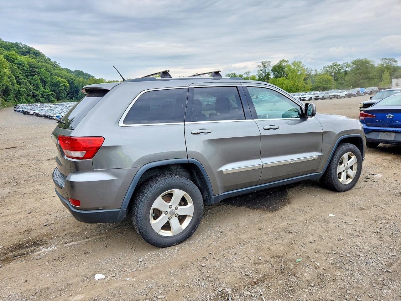 2013 Jeep Grand Cherokee Laredo Серый vin: 1C4RJFAG0DC542612