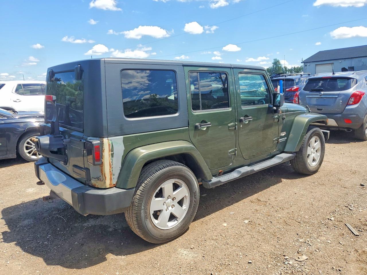 2009 Jeep Wrangler Unlimited Sahara Green vin: 1J4GA59159L733168