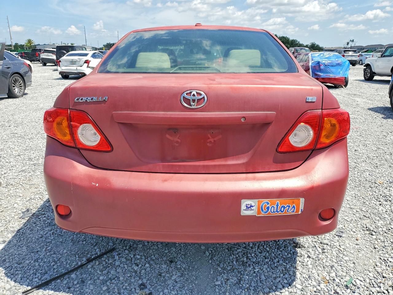 2009 Toyota Corolla Le Red vin: JTDBL40E499034910