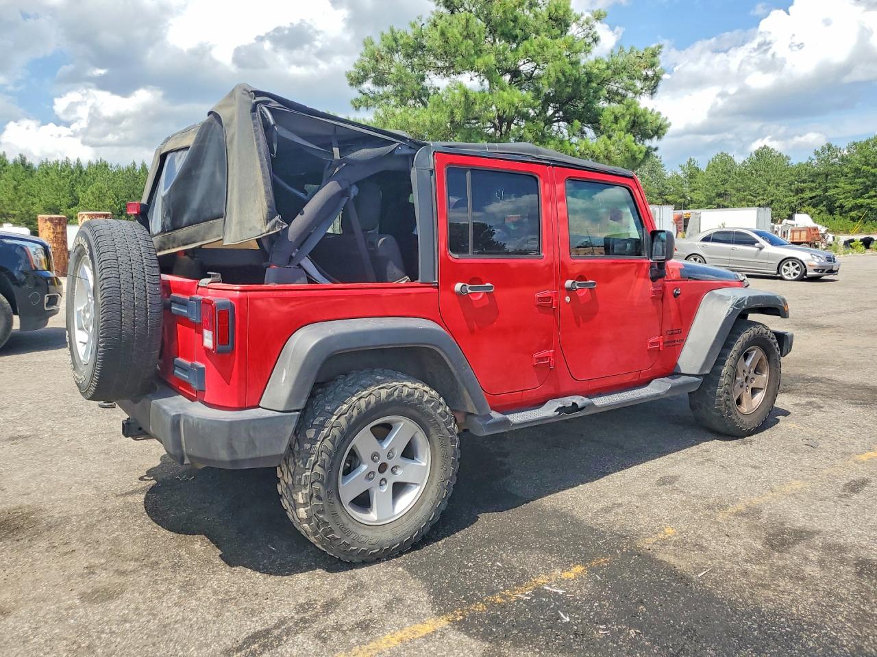 2015 Jeep Wrangler Unlimited Sport Red vin: 1C4BJWDGXFL620877