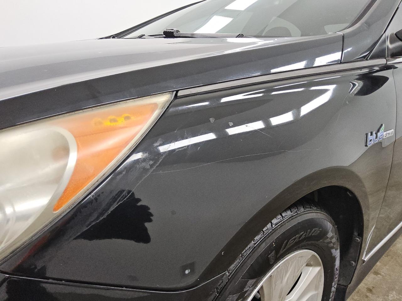 2015 Hyundai Sonata Hybrid Base Black vin: KMHEC4A48FA134792 Damage: Left Front Fender, Chipped, 3