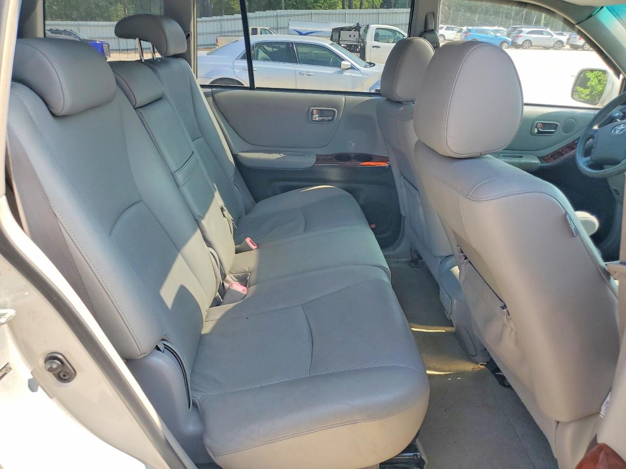 2006 Toyota Highlander Hybrid Gold vin: JTEEW21A860021738