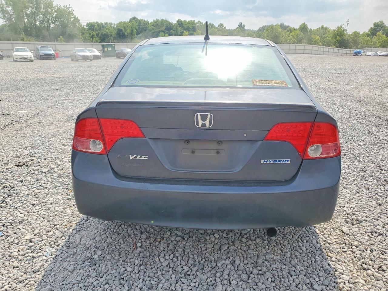 2006 Honda Civic Hybrid Blue vin: JHMFA36236S028386
