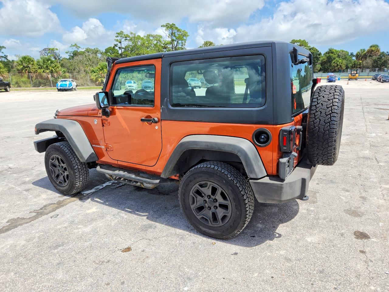 2011 Jeep Wrangler Sport Orange vin: 1J4AA2D16BL574551