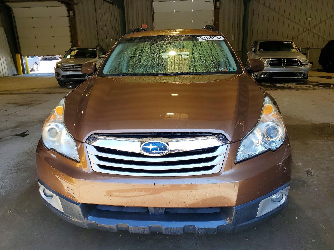 2012 Subaru Outback 2.5i Premium Tan vin: 4S4BRBCCXC3245399