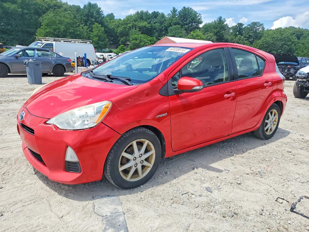 2012 Toyota Prius C Three Red vin: JTDKDTB31C1021590