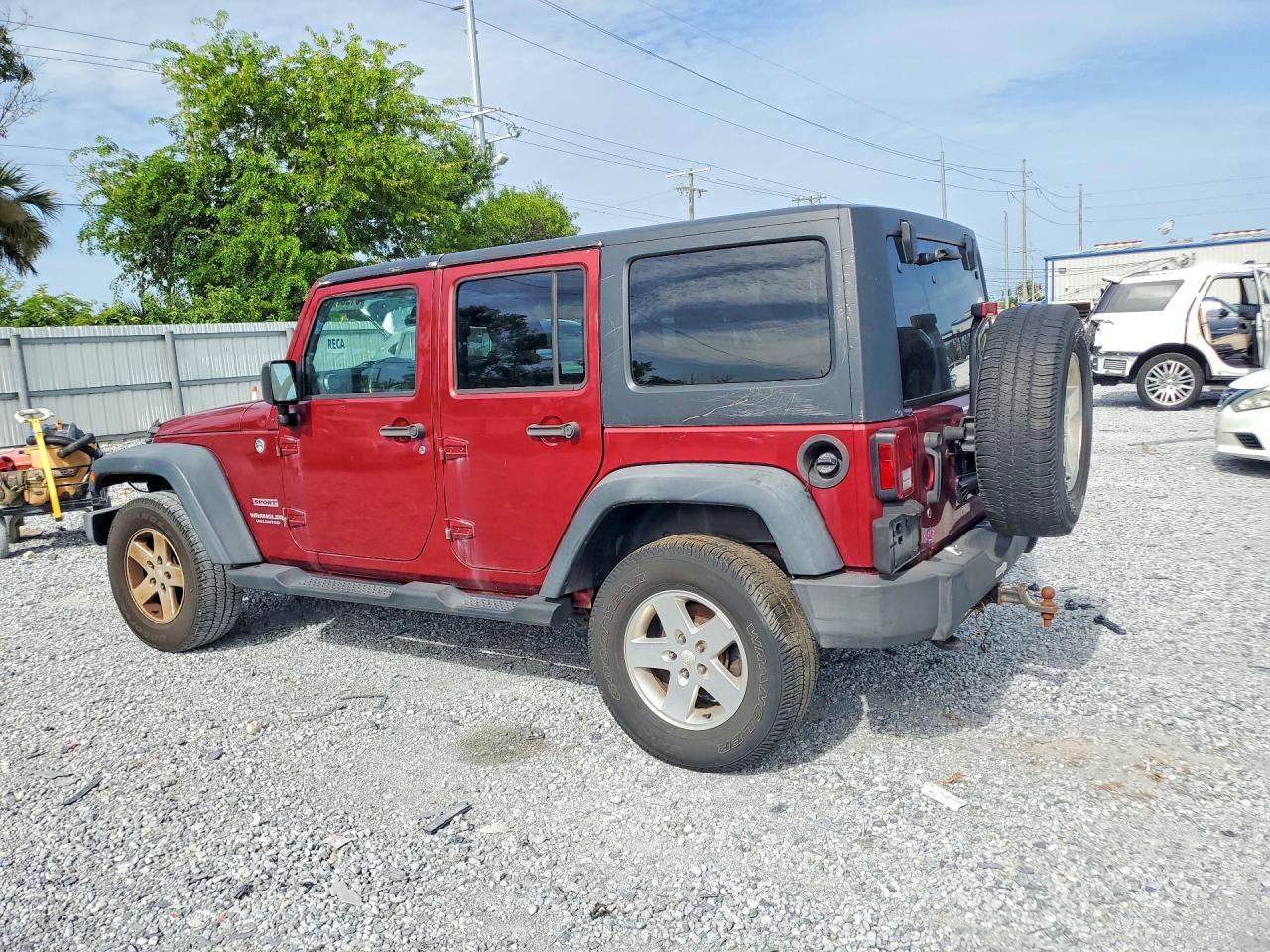 2012 Jeep Wrangler Unlimited Sport Burgundy vin: 1C4BJWDG4CL229137