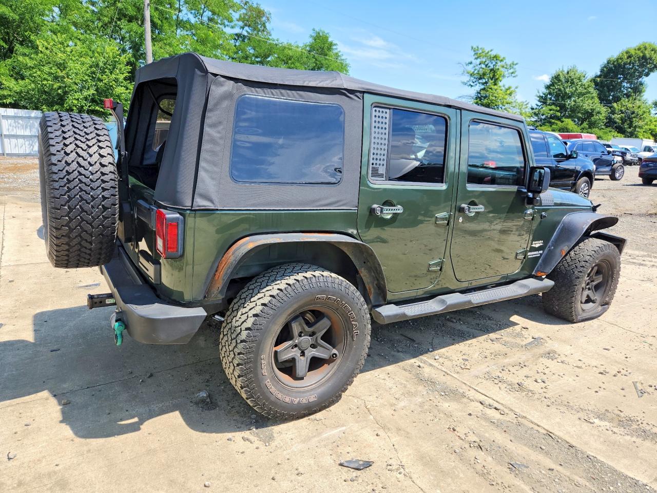 2009 Jeep Wrangler Unlimited Sahara Green vin: 1J4GA59199L733965