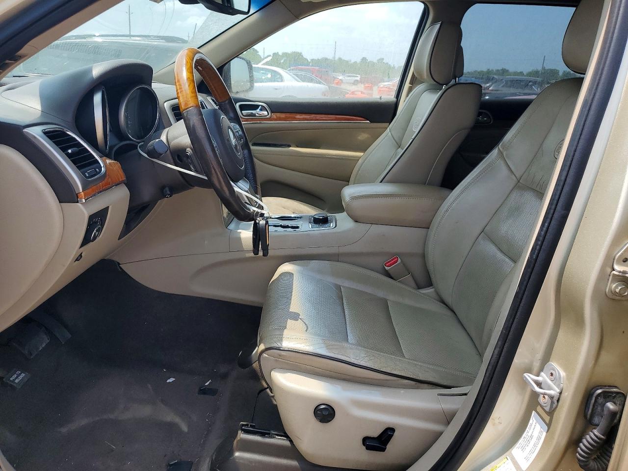 2011 Jeep Grand Cherokee Overland Gold vin: 1J4RR6GT7BC713036