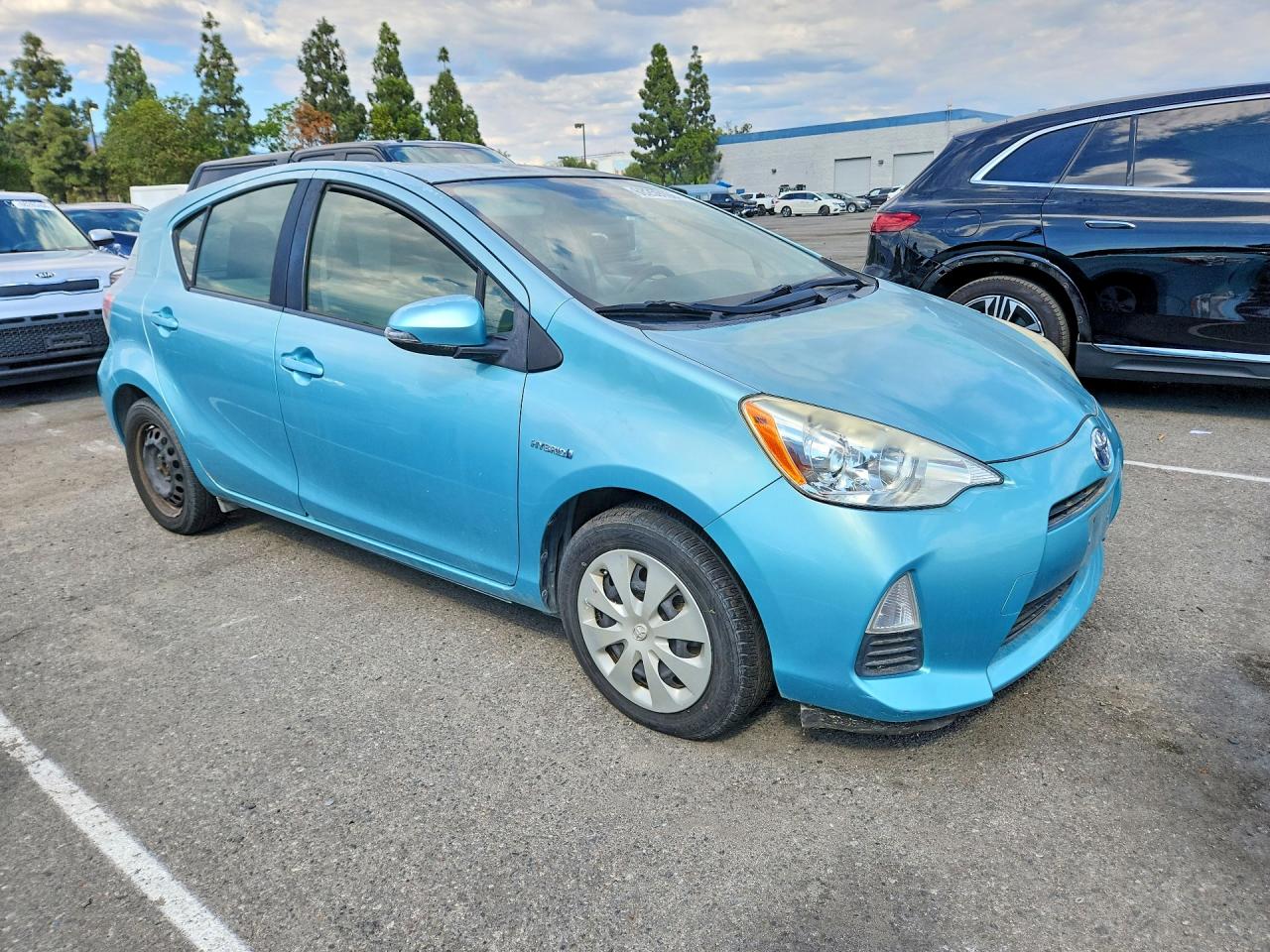 2014 Toyota Prius C One Turquoise vin: JTDKDTB37E1077844